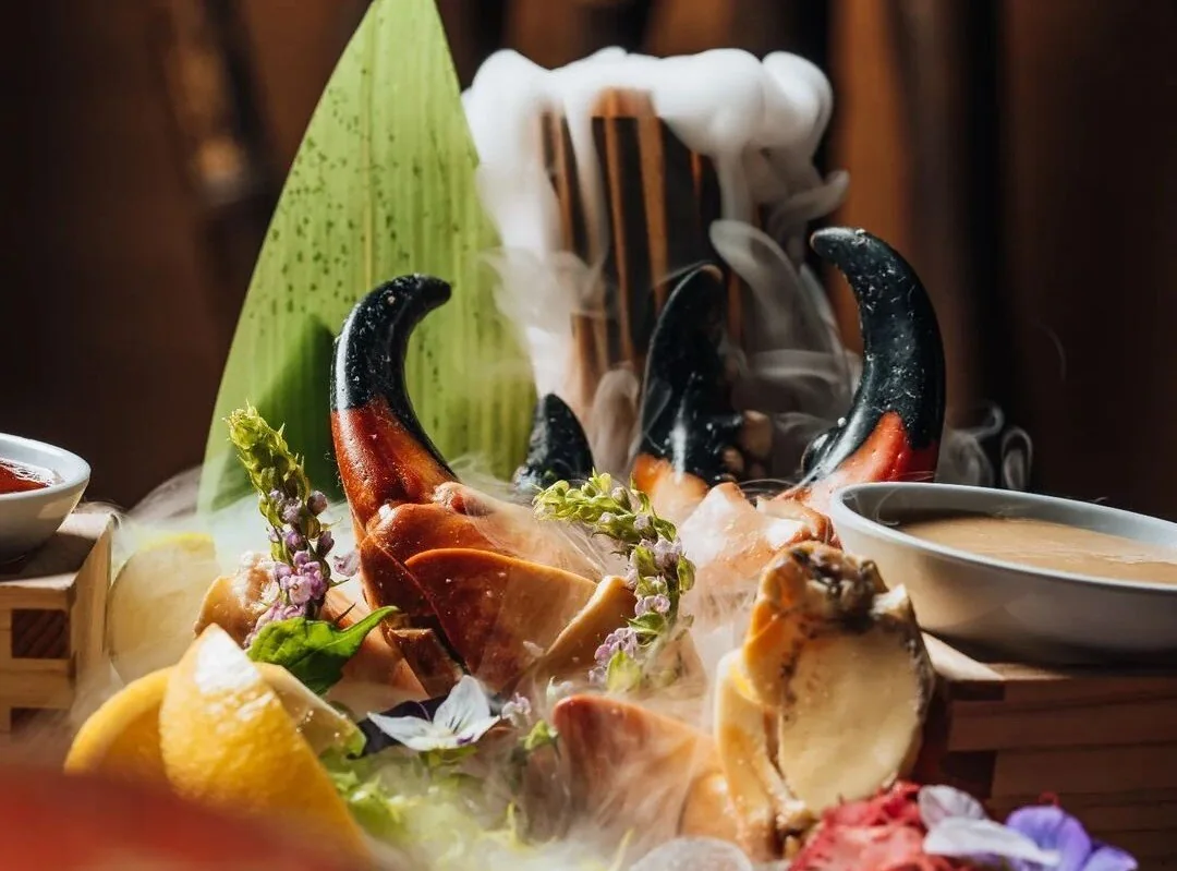 Chef plating a meal