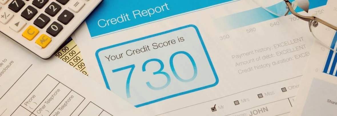Credit report, calculator and pen