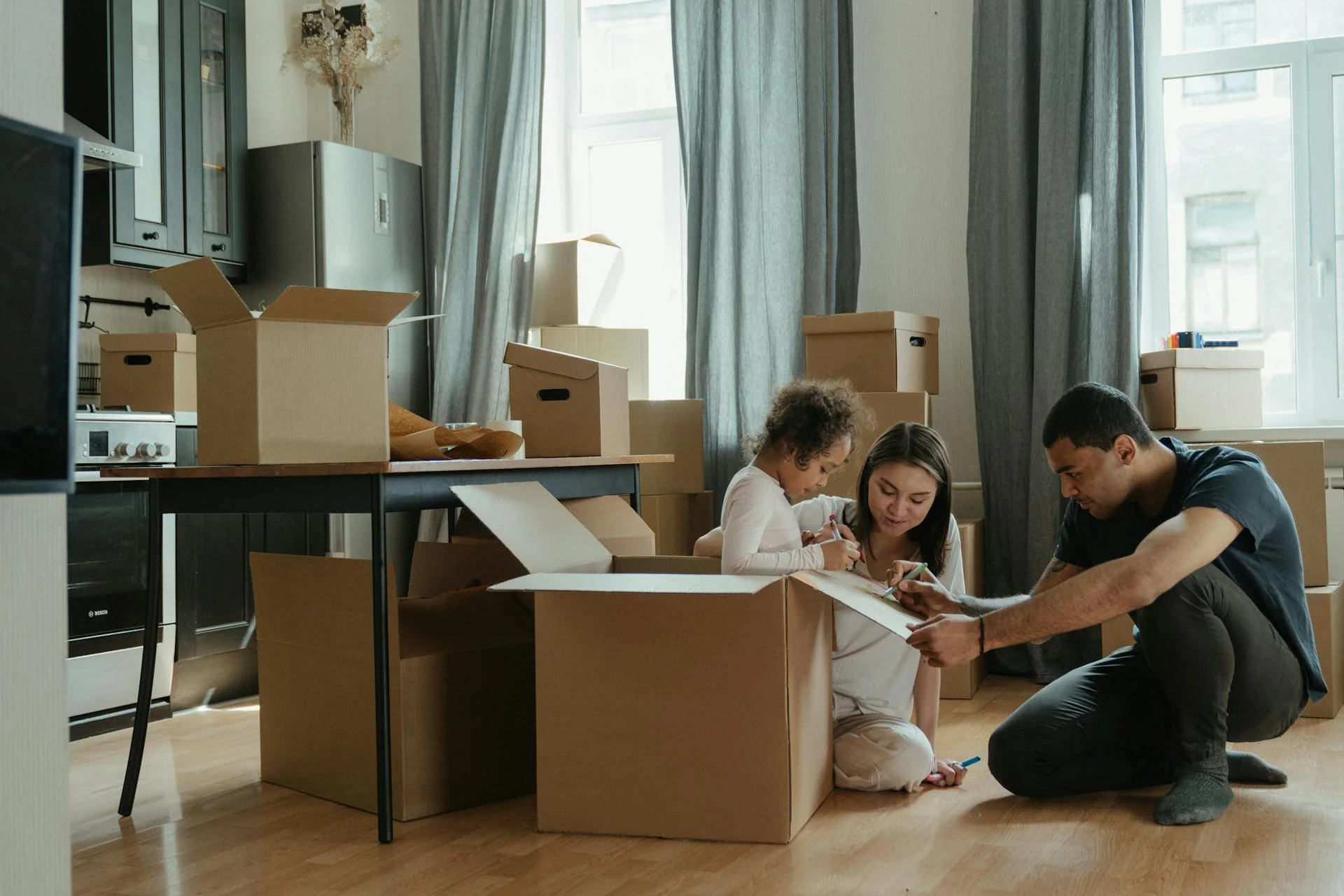 Family unpacking together in their new home