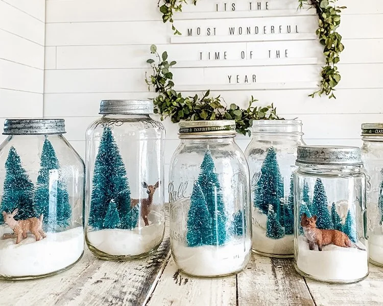 Decorative holiday trees in glass jars
