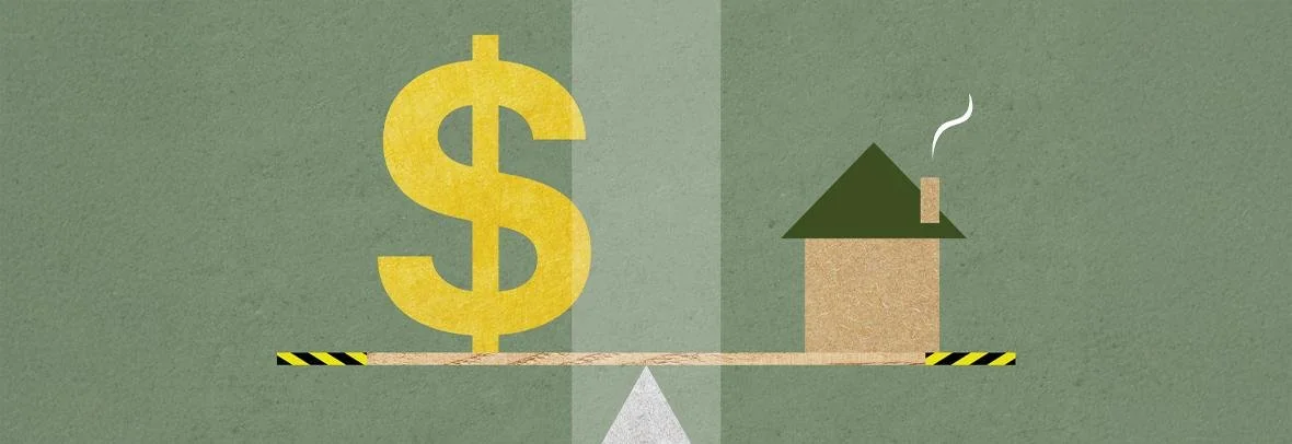 Dollar sign and upward arrow beside a model house