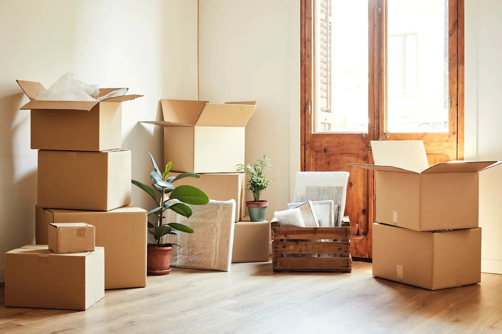 Packed moving boxes in a room